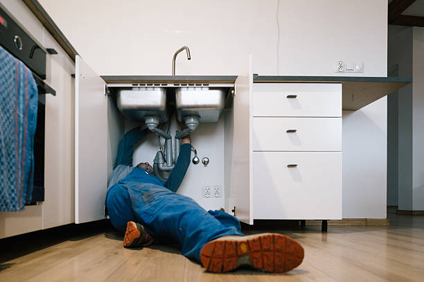 Professional Drain Cleaning technician working in Paisley, FL
